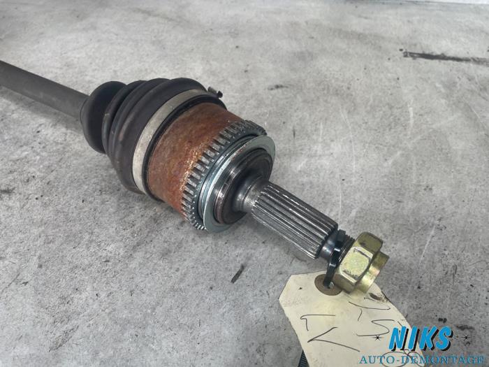 Arbre de transmission avant gauche d'un Hyundai i10 (F5) 1.1i 12V 2009