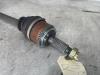 Arbre de transmission avant gauche d'un Hyundai i10 (F5) 1.1i 12V 2009