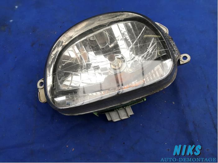 Headlight, left from a Renault Twingo 1999