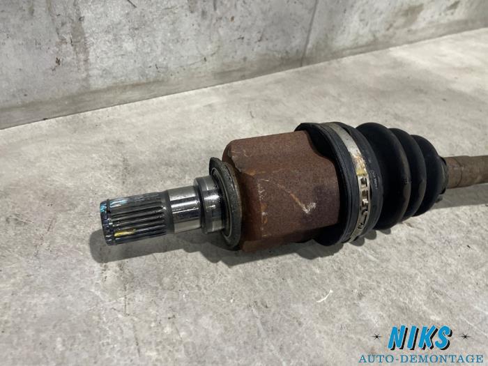 Arbre de transmission avant gauche d'un Hyundai i10 (F5) 1.2i 16V 2009