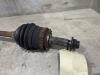 Arbre de transmission avant gauche d'un Hyundai i10 (F5) 1.2i 16V 2009