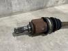 Arbre de transmission avant gauche d'un Hyundai i10 (F5) 1.2i 16V 2009