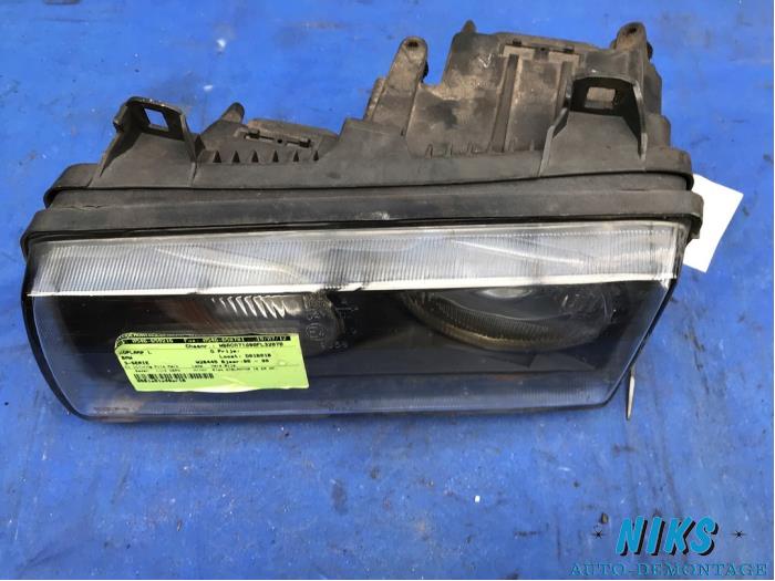 Headlight, left from a BMW 3 serie (E36/4) 316i 1994