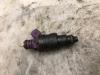 Injector (petrol injection) from a Renault Clio 1998