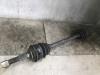 Front drive shaft, left from a Daihatsu Charade (G100/101/102/112) 1.0 TS,CS Special 1990