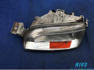 Used Headlight, left Fiat Punto I (176) 60 1.2 S,SX,Selecta Price on request offered by Niks autodemontage