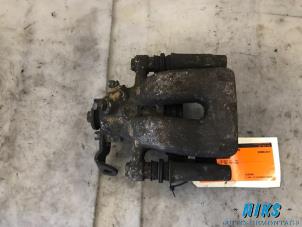 Used Rear brake calliper, left Renault Clio Price on request offered by Niks autodemontage