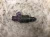 Injector (petrol injection) from a Volvo S40/V40 1996