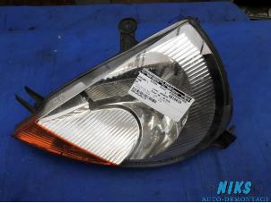 Used Headlight, left Ford Ka I 1.3i Price on request offered by Niks autodemontage
