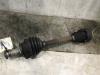 Front drive shaft, left from a Skoda Fabia (6Y5) 1.4i 2002
