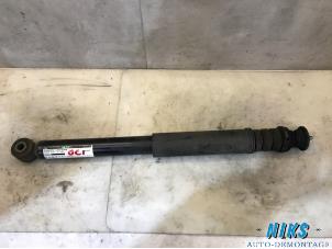 Used Rear shock absorber, left Nissan Note (E11) 1.4 16V Price on request offered by Niks autodemontage