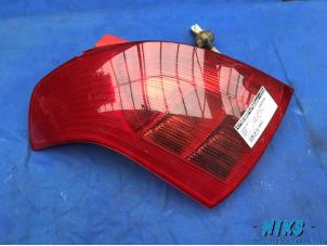 Used Taillight, left Suzuki Swift Price on request offered by Niks autodemontage