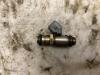 Injector (petrol injection) from a Renault Clio 2001