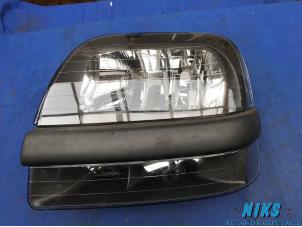 Used Headlight, left Fiat Doblo Price on request offered by Niks autodemontage