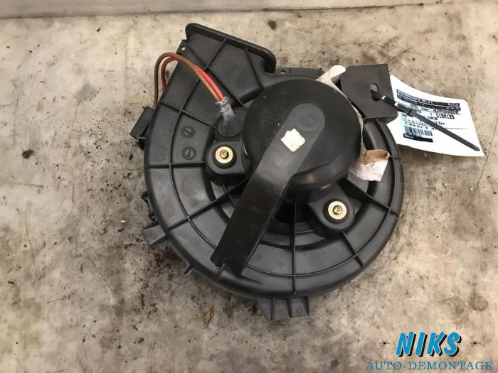 Heating and ventilation fan motor from a Opel Combo (Corsa C) 1.7 DTI 16V 2004