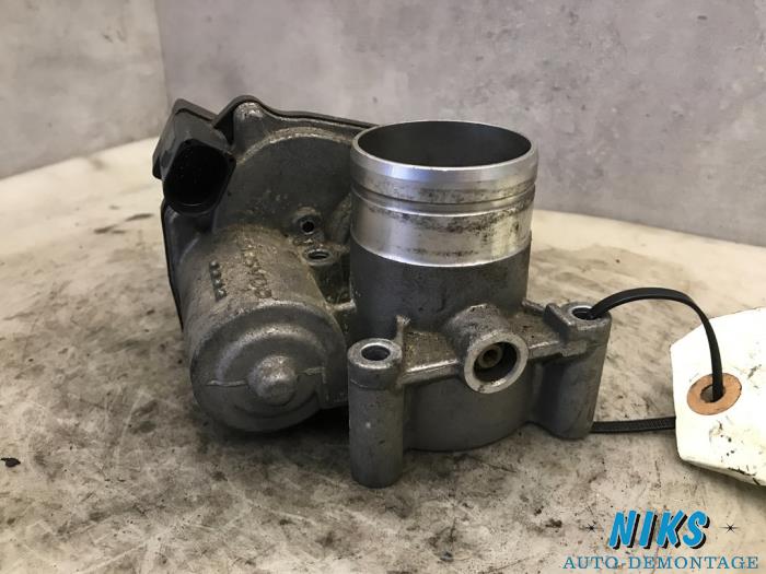 Throttle body from a Volkswagen Polo IV (9N1/2/3) 1.2 2009