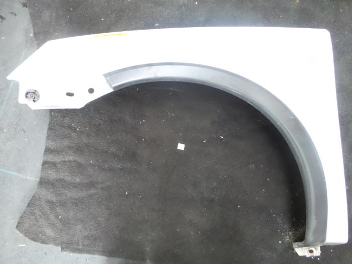 Front wing, left from a Opel Combo (Corsa C) 1.3 CDTI 16V 2006