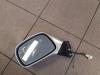 Wing mirror, left from a Opel Agila (A) 1.2 16V 2001