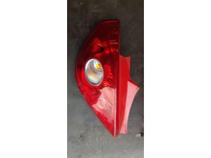 Used Taillight, left Opel Corsa D 1.0 Price € 25,00 Margin scheme offered by Autosloopbedrijf H.C.Stouten