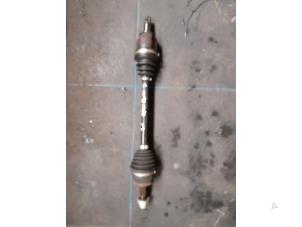 Used Front drive shaft, left Opel Corsa D 1.2 16V Price € 40,00 Margin scheme offered by Autosloopbedrijf H.C.Stouten