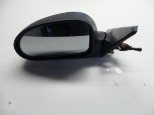 Used Wing mirror, left Hyundai Coupe 2.0i 16V Price € 30,00 Margin scheme offered by Autosloopbedrijf H.C.Stouten