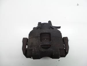 Used Front brake calliper, left Toyota Yaris II (P9) 1.0 12V VVT-i Price € 40,00 Margin scheme offered by Autosloopbedrijf H.C.Stouten