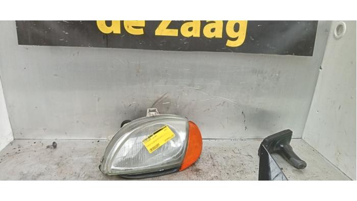 Headlight, left from a Fiat Seicento (187)  2000