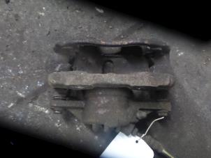Used Front brake calliper, left Peugeot 207/207+ (WA/WC/WM) 1.4 16V Price € 25,00 Margin scheme offered by Autodemontage de Zaag