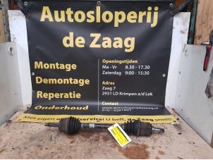 Used Front drive shaft, right Opel Corsa D 1.2 16V Price € 35,00 Margin scheme offered by Autodemontage de Zaag