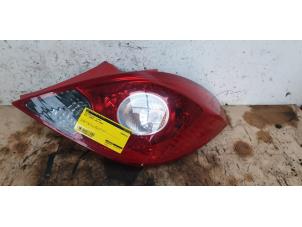 Used Taillight, left Opel Corsa D 1.4 16V Twinport Price € 20,00 Margin scheme offered by Autodemontage de Zaag