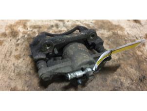 Used Front brake calliper, right Toyota Yaris (P1) 1.3 16V VVT-i Price € 20,00 Margin scheme offered by Autodemontage de Zaag