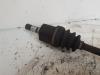 Front drive shaft, left from a Kia Rio (DC22/24) 1.5 16V 2006