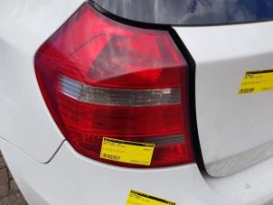 Used Taillight, left BMW 1 serie (E81) 118d 16V Price € 60,00 Margin scheme offered by Autodemontage de Zaag