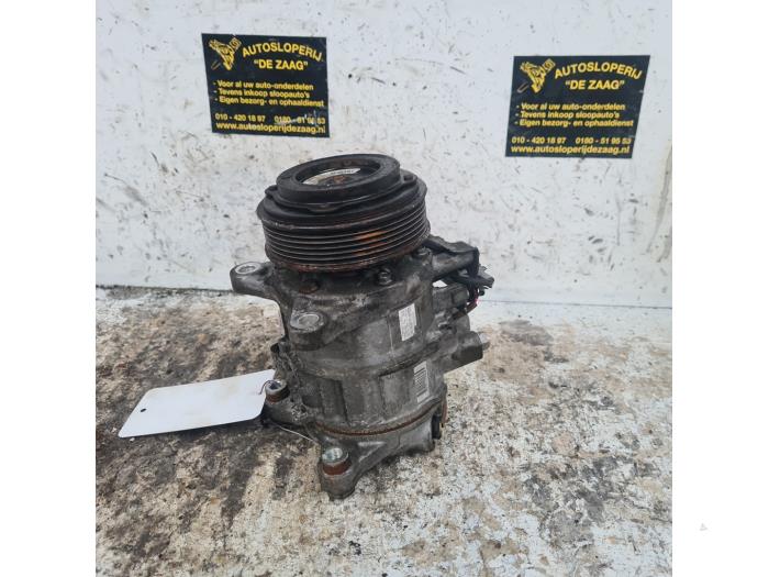 Air conditioning pump from a BMW X1 (E84) xDrive 20d 2.0 16V 2014