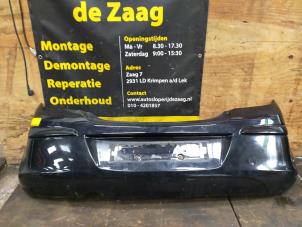 Used Rear bumper Opel Corsa D 1.0 Price € 70,00 Margin scheme offered by Autodemontage de Zaag