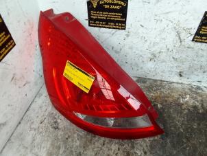 Used Taillight, left Ford Fiesta 6 (JA8) 1.25 16V Price € 30,00 Margin scheme offered by Autodemontage de Zaag