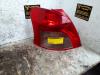 Taillight, left from a Toyota Yaris II (P9), 2005 / 2014 1.3 16V VVT-i, Hatchback, Petrol, 1.298cc, 64kW (87pk), FWD, 2SZFE, 2005-08 / 2010-11, SCP90 2007