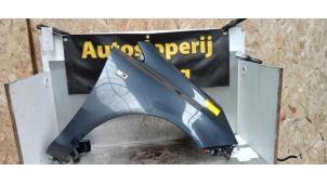 Used Front wing, right Opel Corsa D 1.0 Price € 75,00 Margin scheme offered by Autodemontage de Zaag