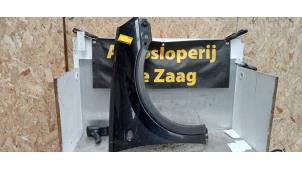 Używane Blotnik prawy przód Opel Corsa C (F08/68) 1.2 16V Cena € 60,00 Procedura marży oferowane przez Autodemontage de Zaag