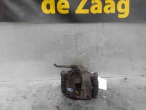 Used Front brake calliper, right Opel Corsa D 1.0 Price € 15,00 Margin scheme offered by Autodemontage de Zaag
