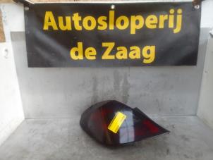Used Taillight, left Opel Corsa D 1.6i GSI 16V Turbo Ecotec Price € 25,00 Margin scheme offered by Autodemontage de Zaag