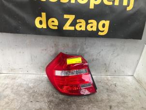 Used Taillight, left BMW 1 serie (E81) 116i 1.6 16V Price € 45,00 Margin scheme offered by Autodemontage de Zaag