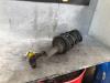 Fronts shock absorber, left from a Toyota Yaris (P1) 1.0 16V VVT-i 2002
