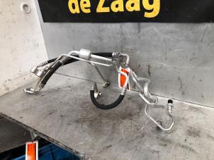 Usados Tubo de aire acondicionado Opel Corsa E 1.4 Turbo 16V Precio € 50,00 Norma de margen ofrecido por Autodemontage de Zaag