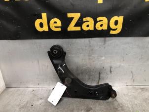 Used Front wishbone, left Opel Corsa E 1.4 Turbo 16V Price € 35,00 Margin scheme offered by Autodemontage de Zaag