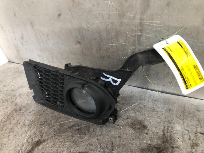Fog light, front right from a BMW 3 serie (E92) 320i 16V 2010