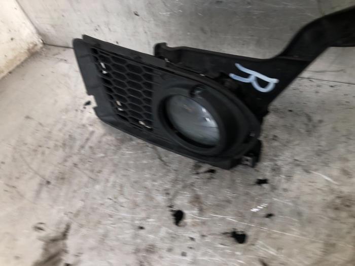 Fog light, front right from a BMW 3 serie (E92) 320i 16V 2010