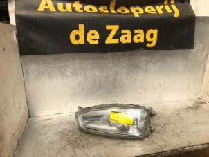 Used Headlight, left Mitsubishi Colt (CJ) 1.3 GL,GLX 12V Price € 40,00 Margin scheme offered by Autodemontage de Zaag