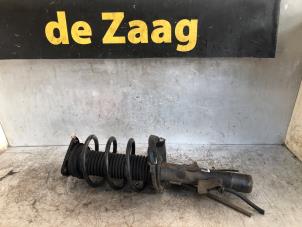 Used Front shock absorber rod, left Ford Focus 2 1.6 16V Price € 40,00 Margin scheme offered by Autodemontage de Zaag