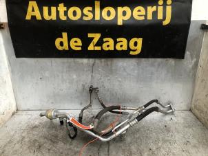 Usados Tubo de aire acondicionado Opel Corsa D 1.2 16V Precio € 80,00 Norma de margen ofrecido por Autodemontage de Zaag